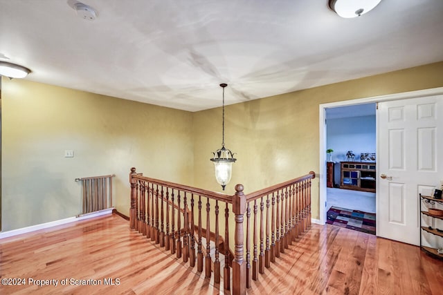 corridor featuring hardwood / wood-style flooring