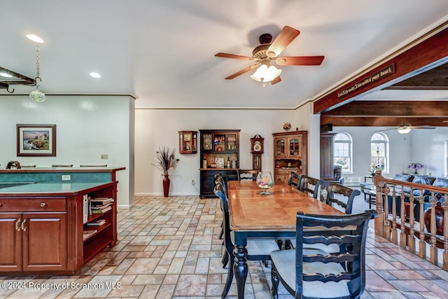 dining space with ceiling fan