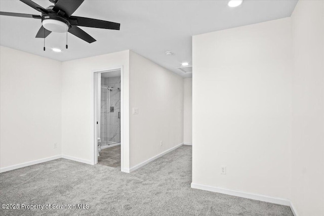 interior space with carpet flooring, a ceiling fan, baseboards, and recessed lighting