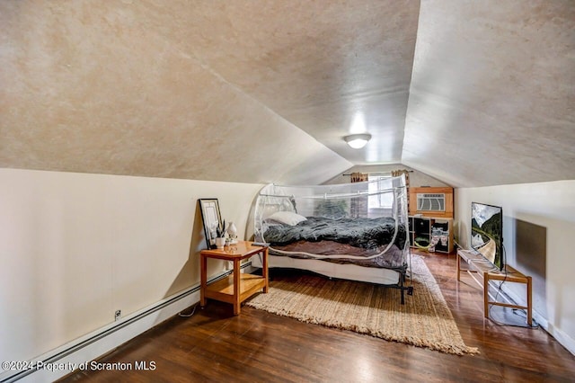 bedroom with dark hardwood / wood-style flooring, vaulted ceiling, baseboard heating, and a wall unit AC