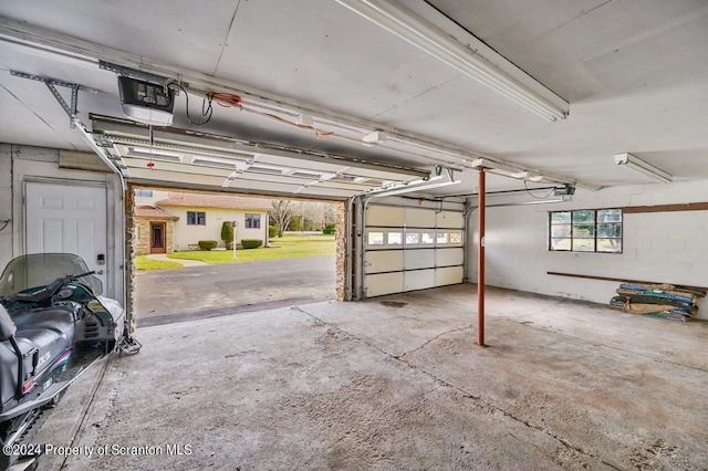 garage featuring a garage door opener