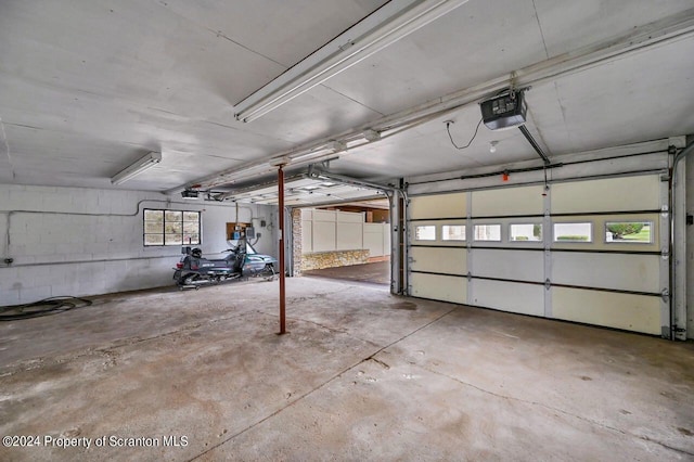 garage featuring a garage door opener