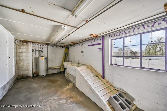 basement with sink and water heater