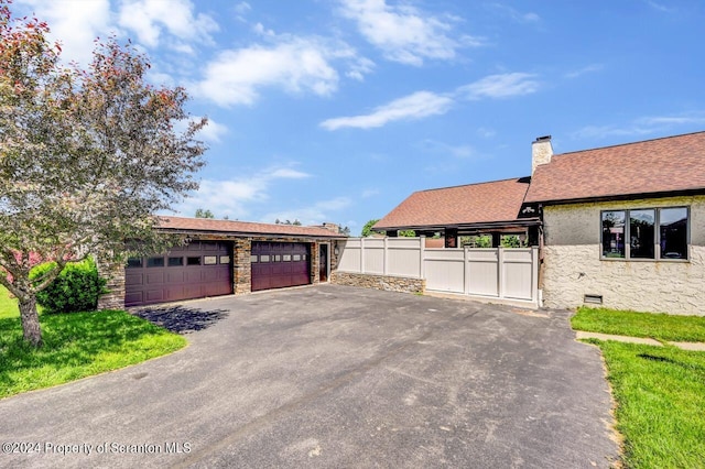 exterior space with a garage