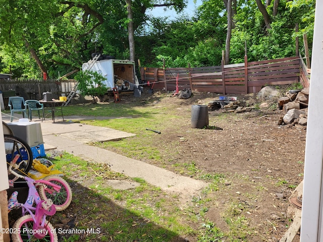 134 Taroli St, Old Forge, PA 18518 - fenced backyard with a patio