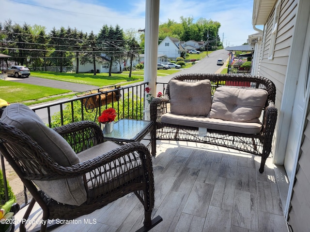 134 Taroli St, Old Forge, PA 18518 - wooden porch with a residential view