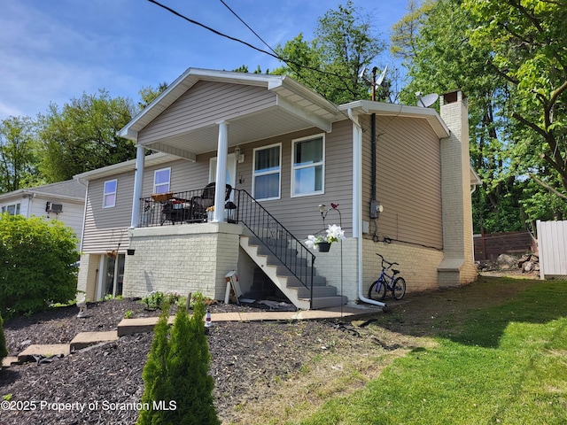 134 Taroli St, Old Forge, PA 18518 - view of front of home featuring stairs, a chimney, and a porch