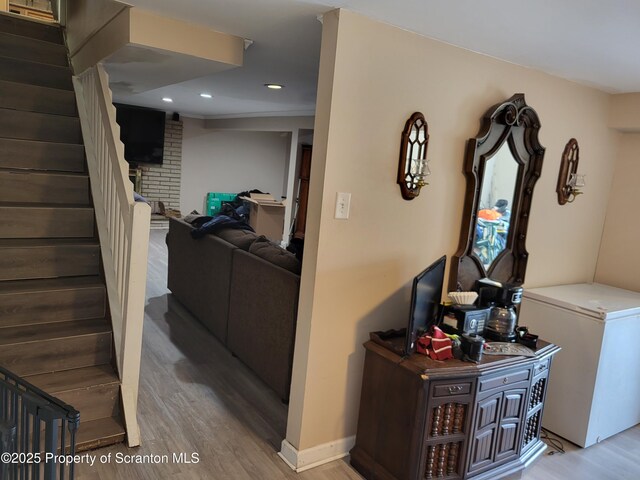 134 Taroli St, Old Forge, PA 18518 - corridor with wood finished floors, stairway, and recessed lighting