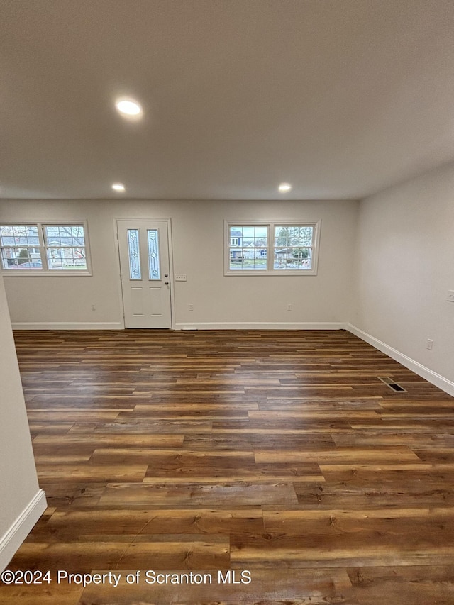 entrance foyer featuring dark hardwood / wood-style flooring