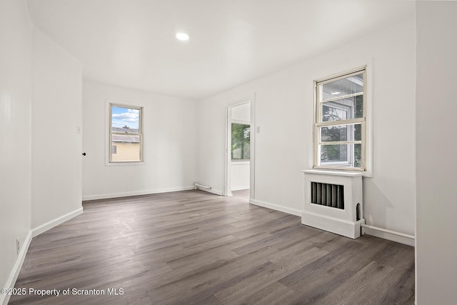 810 Pittston Ave, Scranton, PA 18505 - spare room with wood finished floors and recessed lighting