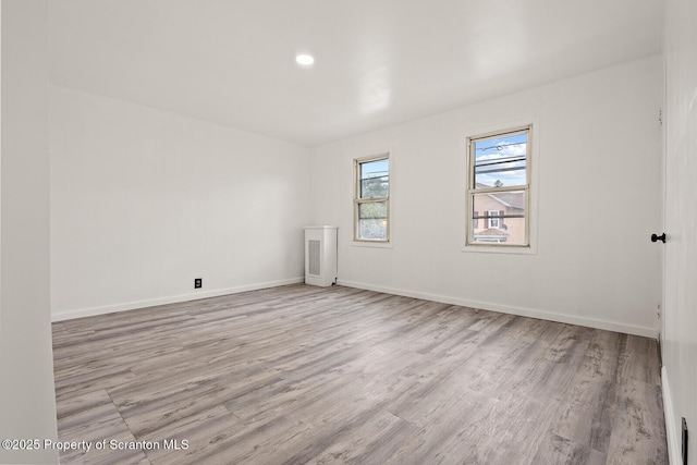 810 Pittston Ave, Scranton, PA 18505 - spare room with wood finished floors and recessed lighting