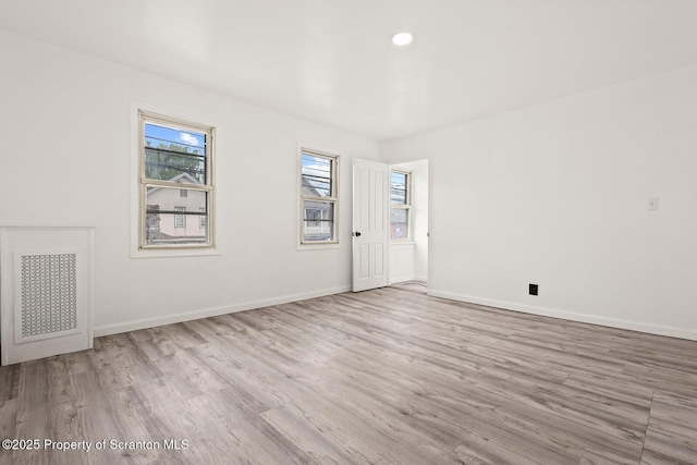 810 Pittston Ave, Scranton, PA 18505 - empty room featuring plenty of natural light, wood finished floors, and recessed lighting