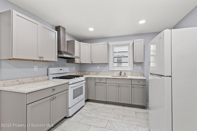 810 Pittston Ave, Scranton, PA 18505 - kitchen featuring white appliances, wall chimney range hood, gray cabinetry, light marble finish floors, and recessed lighting