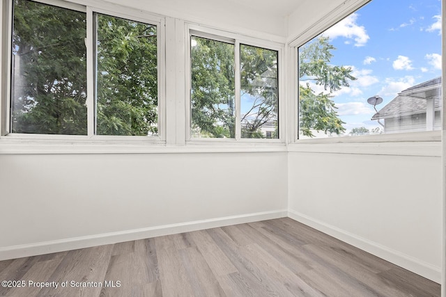 810 Pittston Ave, Scranton, PA 18505 - unfurnished sunroom featuring wood finished floors and plenty of natural light