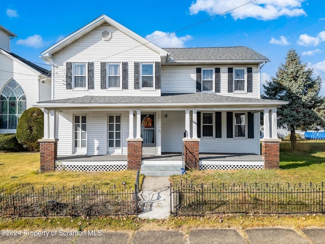 front of property featuring covered porch