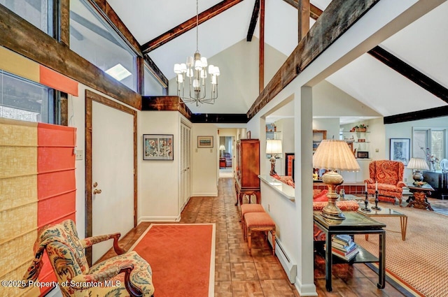 interior space featuring high vaulted ceiling, an inviting chandelier, beam ceiling, and baseboards