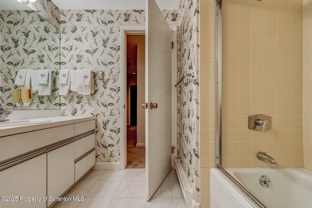 bathroom featuring tile patterned floors, baseboards, wallpapered walls, vanity, and enclosed tub / shower combo