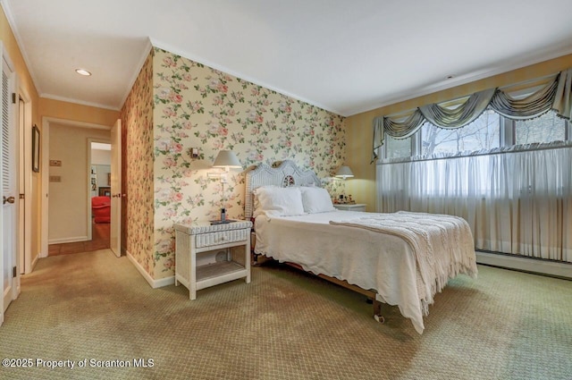 carpeted bedroom featuring a baseboard radiator, baseboards, ornamental molding, and wallpapered walls
