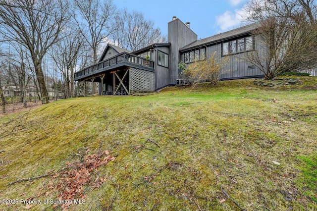 view of yard featuring a deck
