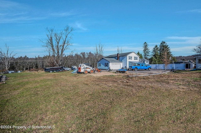 view of yard with a garage