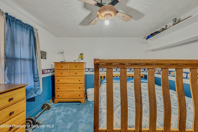 unfurnished bedroom with ceiling fan and light carpet