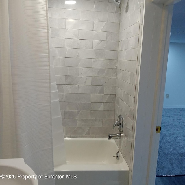 bathroom featuring shower / bath combination with curtain