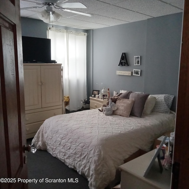 bedroom featuring a drop ceiling