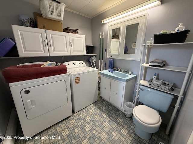 298 Crosstown Hwy, Union Dale, PA 18470 - laundry area featuring washer and dryer and crown molding