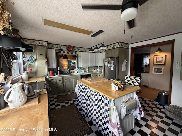 298 Crosstown Hwy, Union Dale, PA 18470 - kitchen featuring freestanding refrigerator, light flooring, a textured ceiling, dishwasher, and a ceiling fan