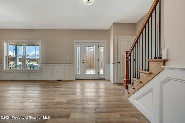 entrance foyer featuring light hardwood / wood-style floors