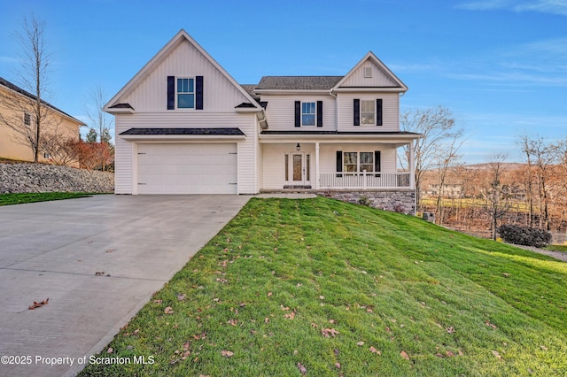 view of front facade with covered porch, concrete driveway, board and batten siding, a front yard, and a garage