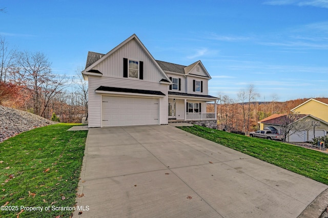 view of front of property with driveway, a porch, a front lawn, and board and batten siding