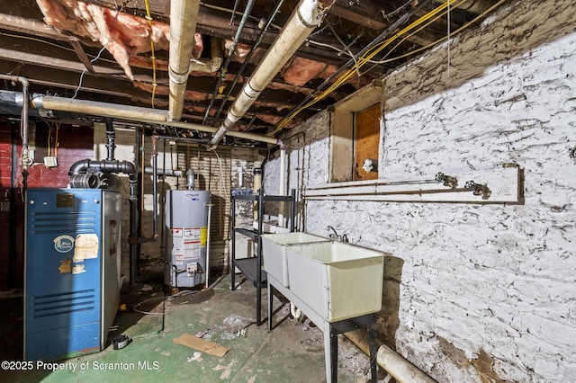 unfinished below grade area with a sink and gas water heater