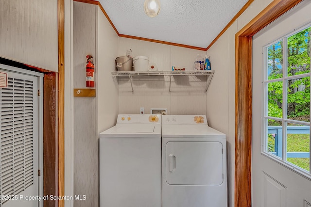 13 Hillside St Unit L 25, Nicholson, PA 18446 - laundry area featuring ornamental molding, a heating unit, washer and dryer, a textured ceiling, and healthy amount of natural light