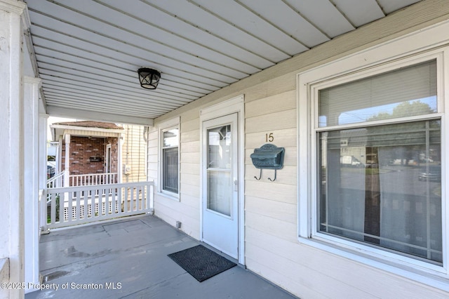 15 Leonard St, Wilkes-Barre, PA 18702 - doorway to property featuring covered porch