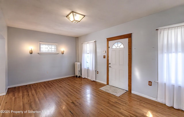 15 Leonard St, Wilkes-Barre, PA 18702 - foyer with radiator and wood finished floors