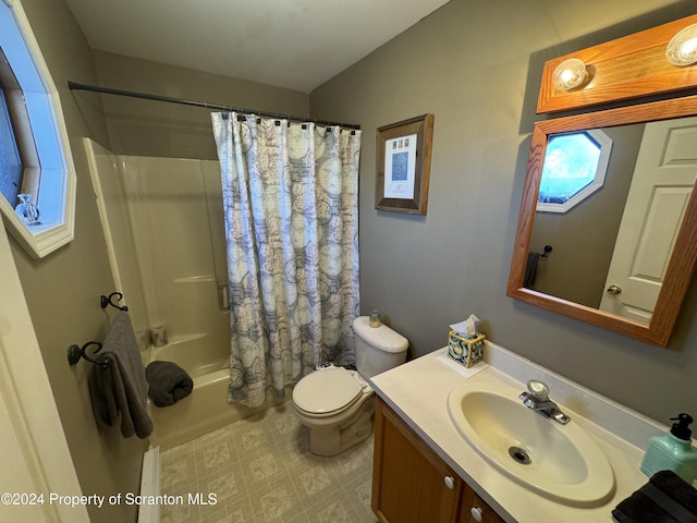 full bathroom featuring vanity, toilet, and shower / bathtub combination with curtain