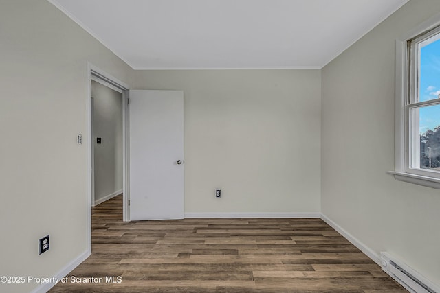 633 Connell St, Scranton, PA 18505 - unfurnished room with baseboard heating, ornamental molding, and wood finished floors