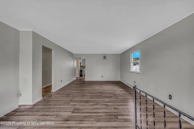 633 Connell St, Scranton, PA 18505 - unfurnished living room featuring wood finished floors and baseboards