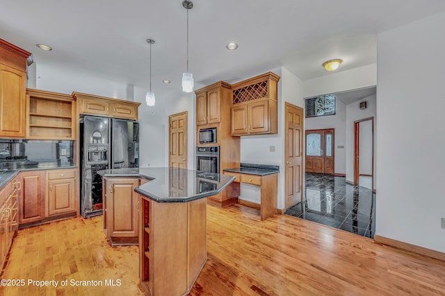 kitchen with decorative light fixtures, open shelves, dark countertops, a kitchen island, and black appliances