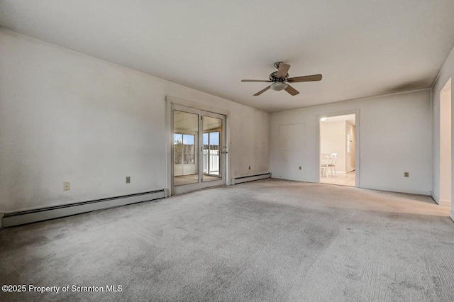 unfurnished room with a baseboard heating unit, light carpet, ceiling fan, and baseboards