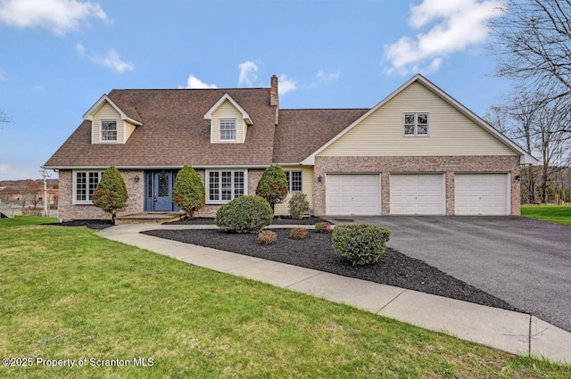 cape cod-style house with a garage, a front lawn, and brick siding