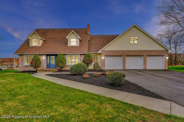 spare room featuring a baseboard heating unit, light carpet, attic access, and ceiling fan