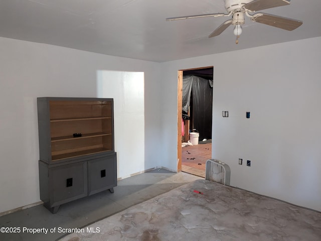 spare room with ceiling fan