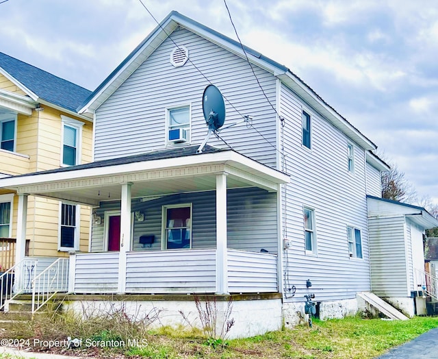 view of front of house featuring covered porch