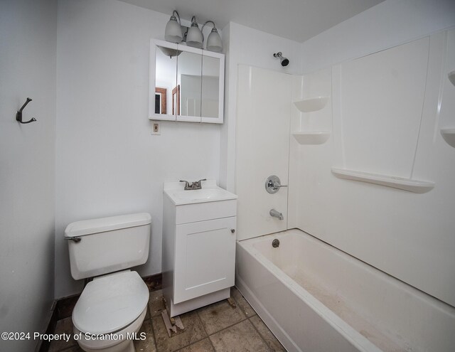 full bathroom featuring shower / tub combination, vanity, and toilet