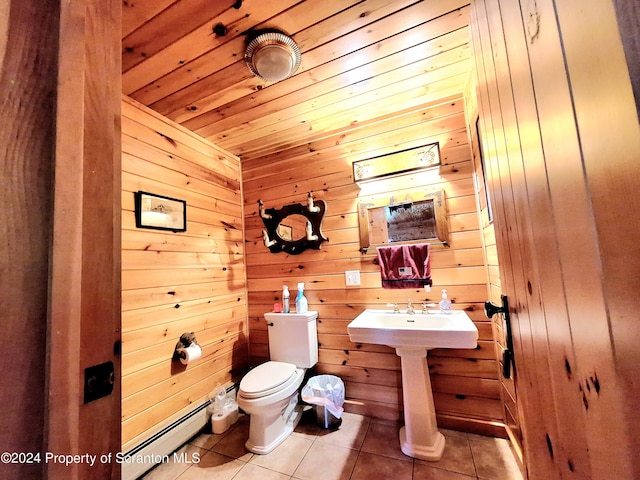 bathroom with wooden ceiling, a baseboard heating unit, tile patterned floors, wooden walls, and toilet