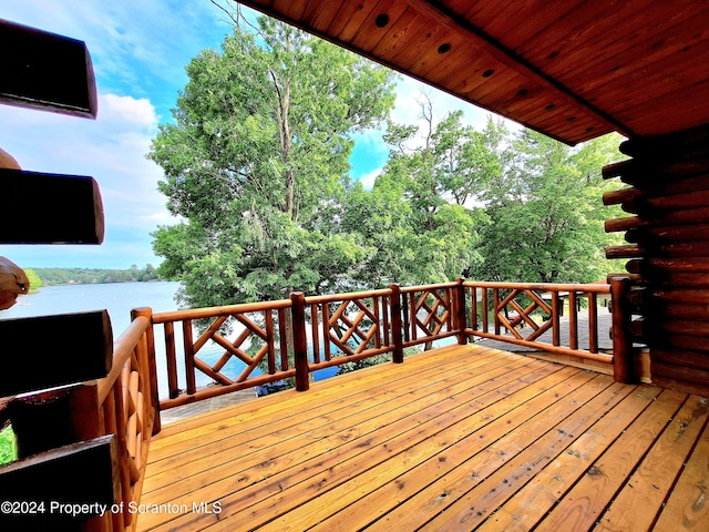 deck featuring a water view