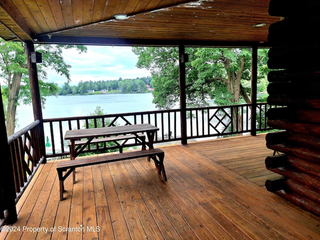 deck featuring a water view