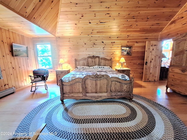 bedroom with wood ceiling, multiple windows, and vaulted ceiling